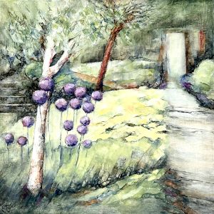 Purple Alliums and yellow daylilies beside the garden path